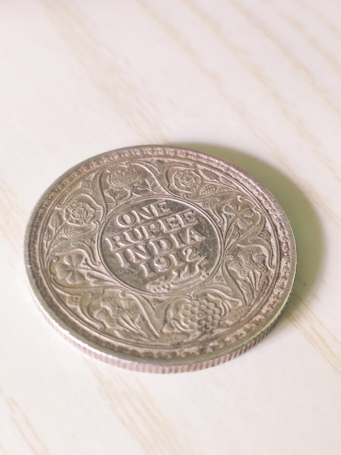 A 108 year old one rupee Indian coin