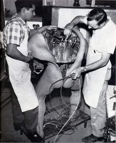 Biomechanical engineers applying the finishing touches to Mark Zuckerberg (February 1984)