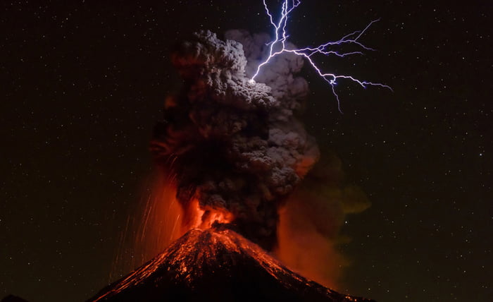 Colima volcano eruption with lightning. (This is a real photograph, taken by Sergio Velasco)