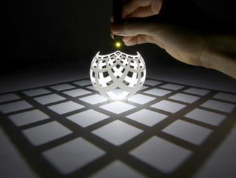 Mathematician Henry Segerman demonstrates how a linear third dimensional plane is really only a projection of the curved fourth dimensional spacetime