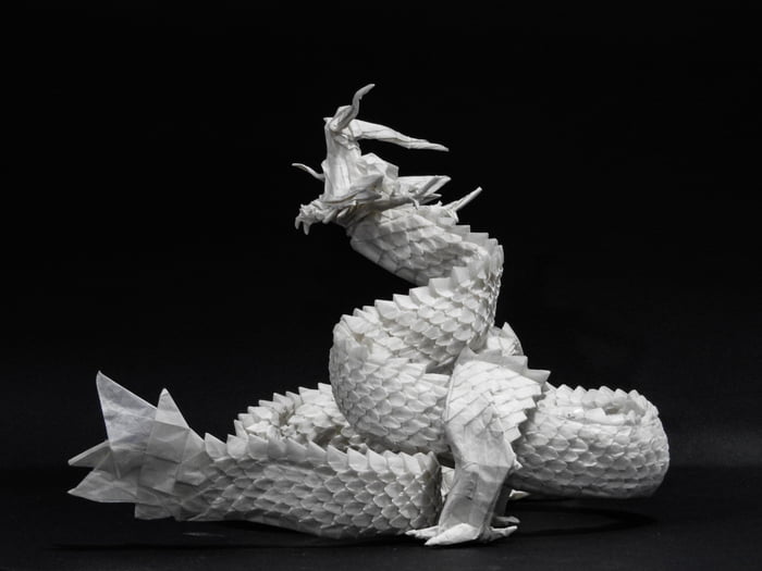 Ryujin, an origami model dragon designed by Satoshi Kamiya. Made by hand with one sheet of paper.