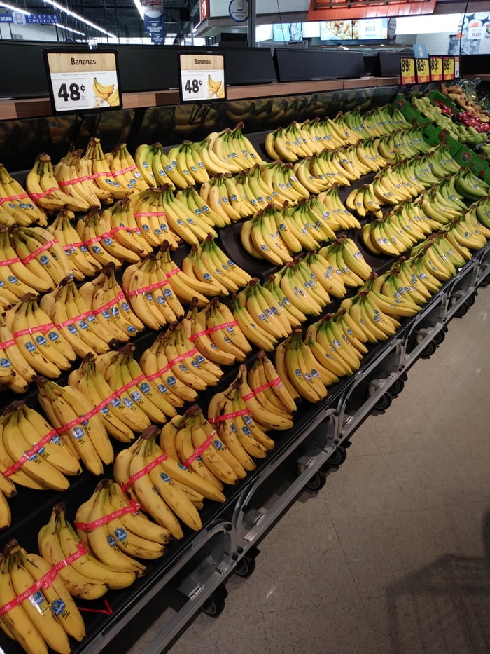 This store arranges bananas by ripeness.