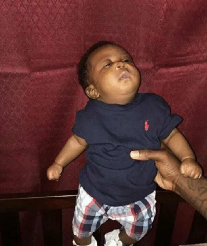 Why is he holding him like this